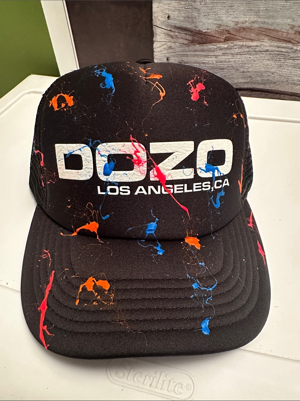 DOZO Los Angeles Black Trucker Hat with Orange & Blue Paint-Splatter